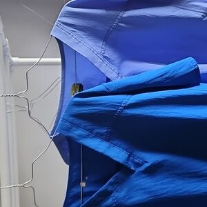 Two pack wink scrubs shirts. 2x